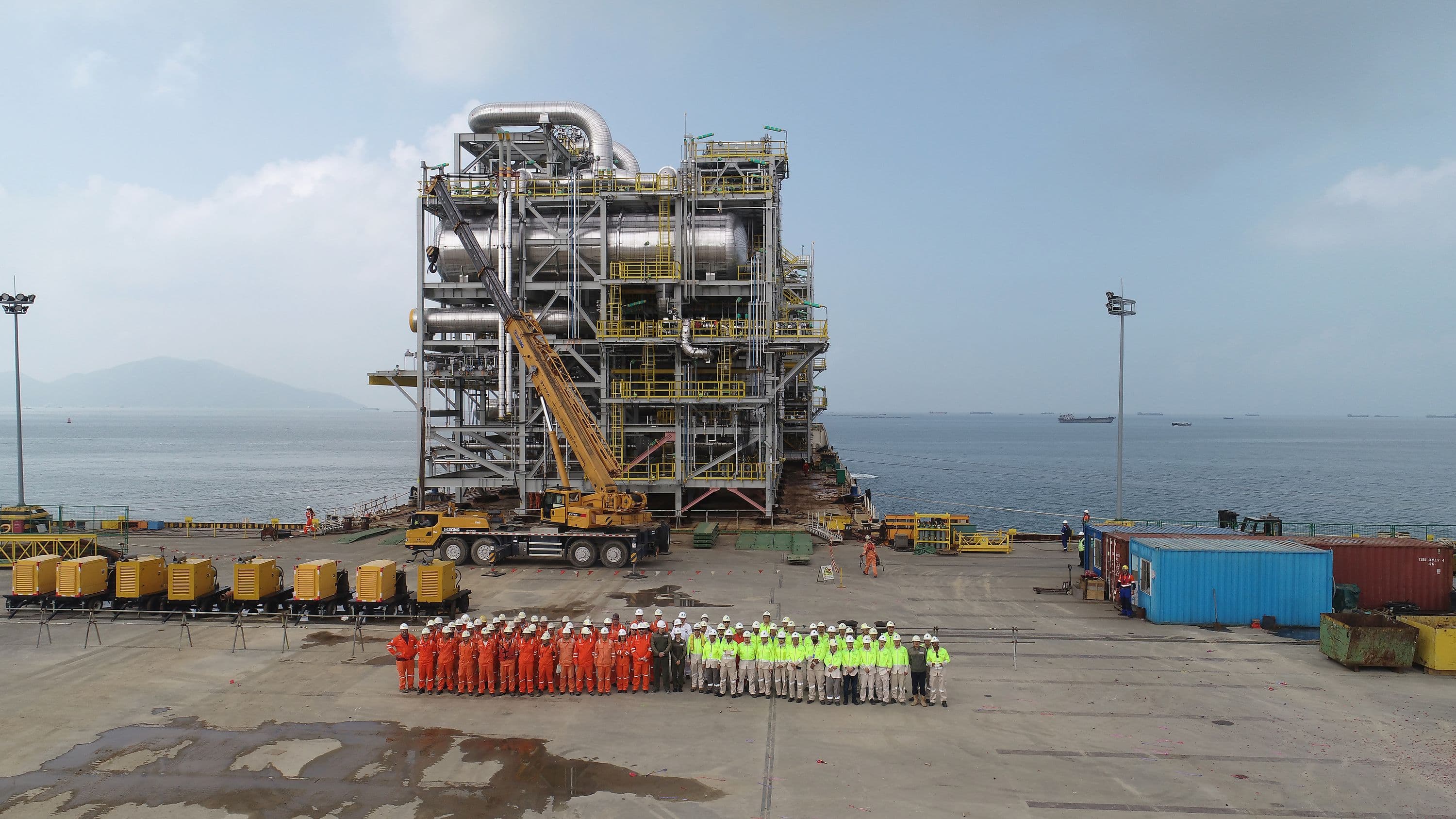 COOEC-Fluor fabrication team in front of module