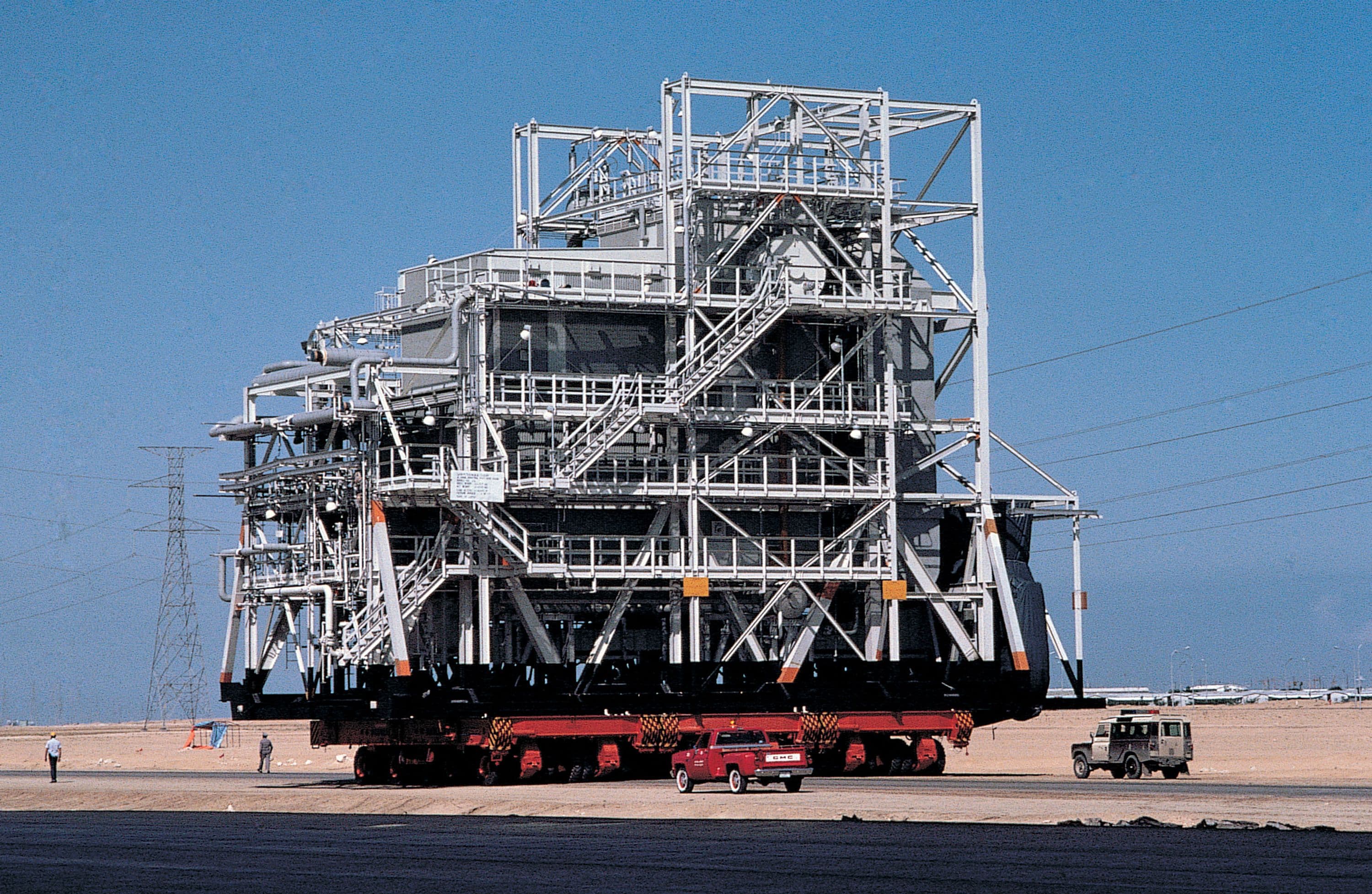 Furnace module being moved to project site on self-powered transporter