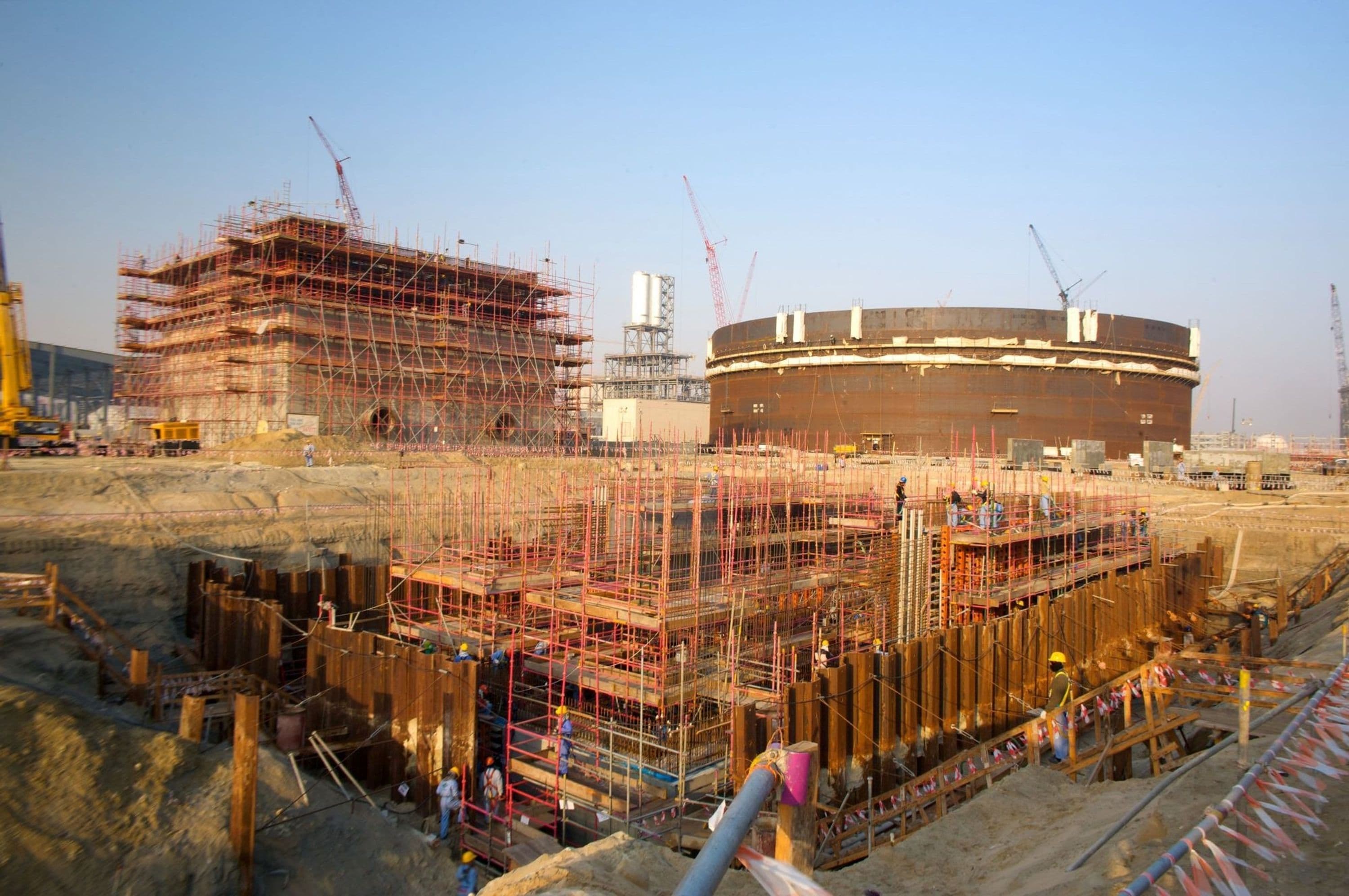 Construction of seawater intake and outfall structure with firewater tank in background