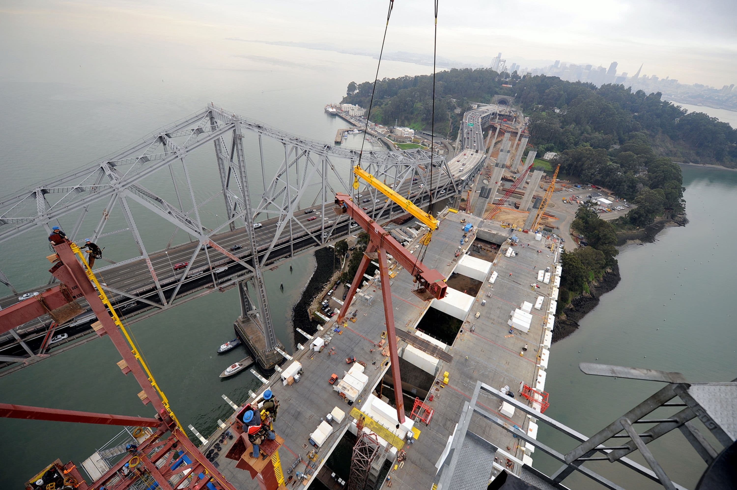 Ironworkers await truss piece. Photo © Joseph A. Blum