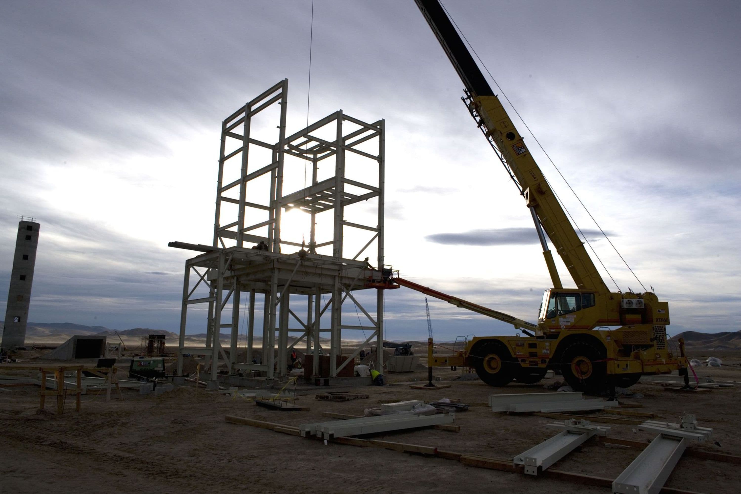 Crane placing steel for crusher building