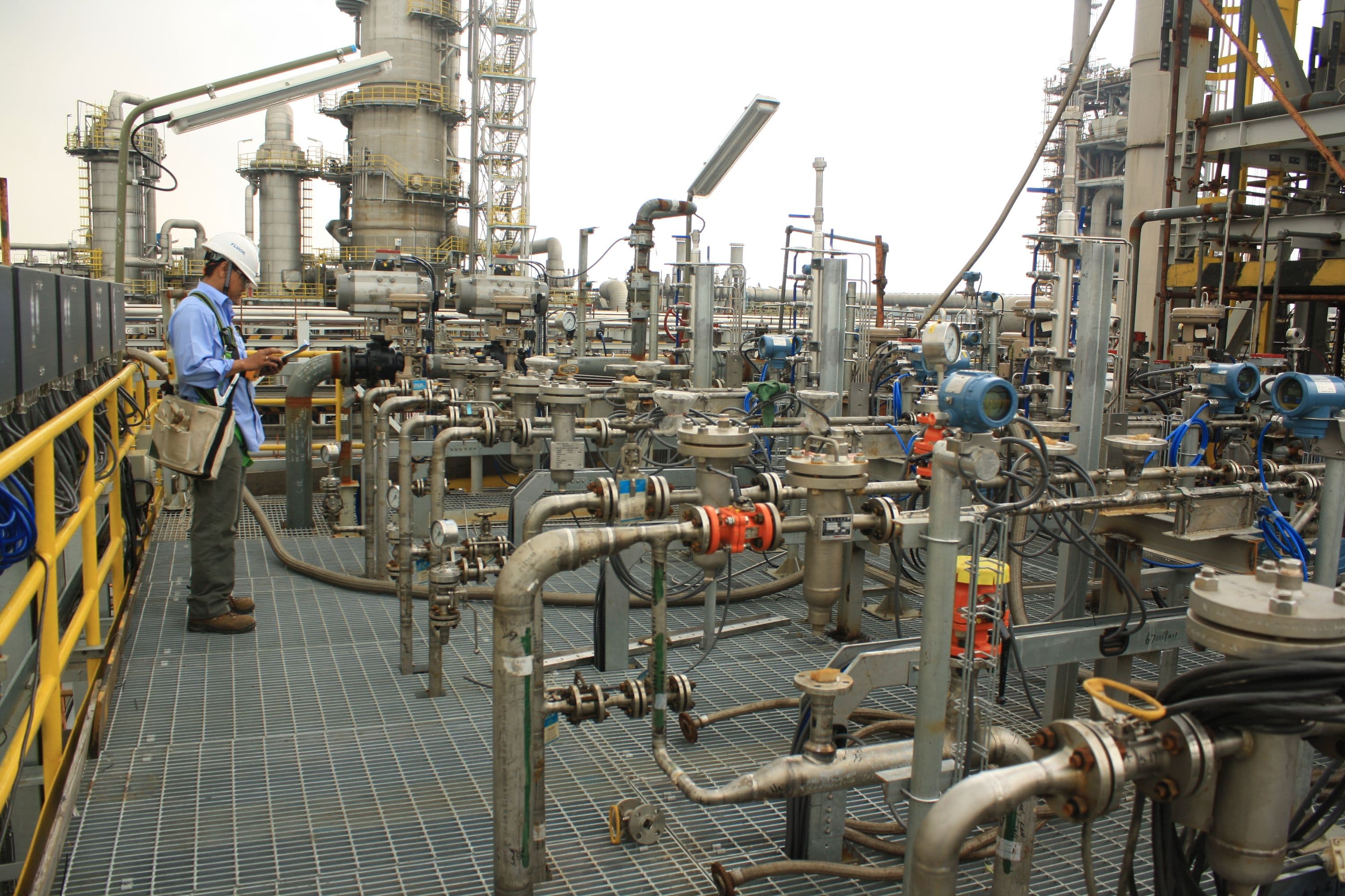 Construction supervisor checking valve trains