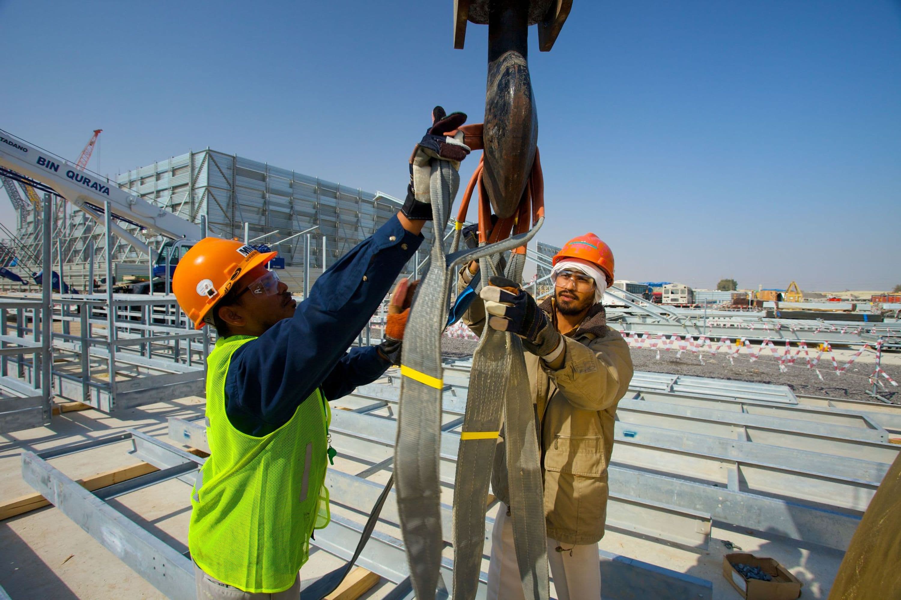 Workers on construction of ethylene ground flare