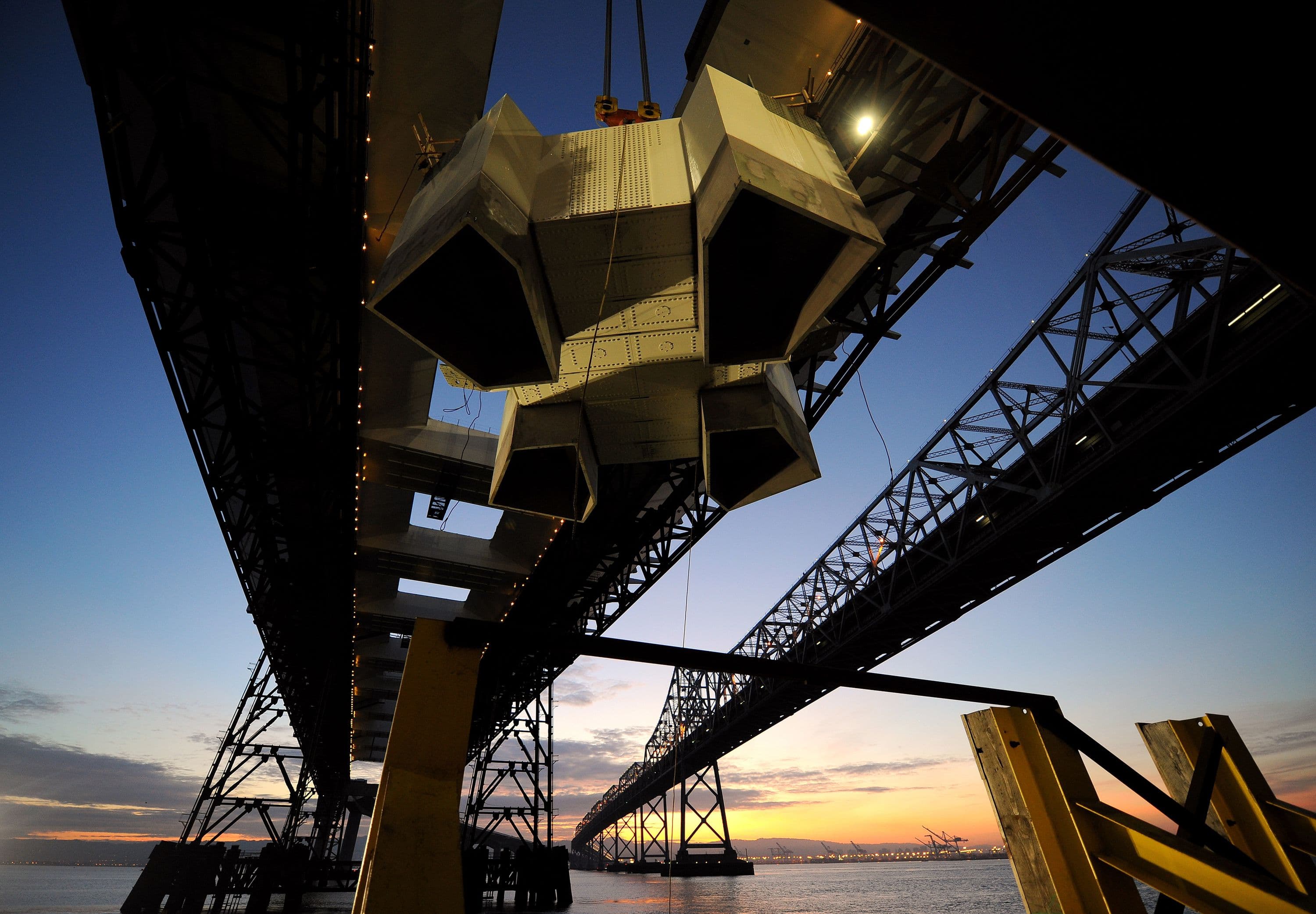 Lifting grillage to top of SAS bridge tower. Photo © Joseph A. Blum